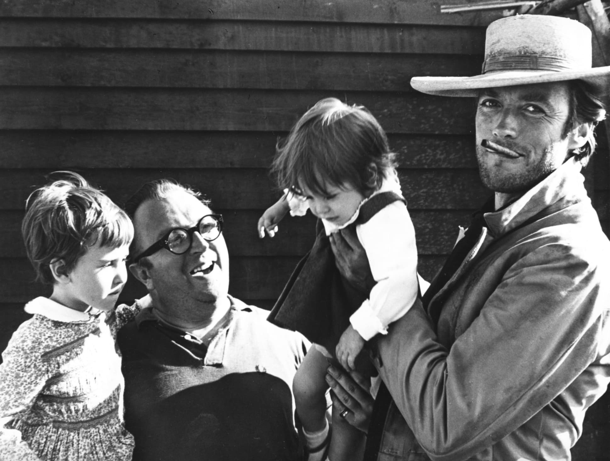 “Clint Eastwood with Sergio Leone and his daughters on the set of The Good, The Bad and the Ugly, 1966.”